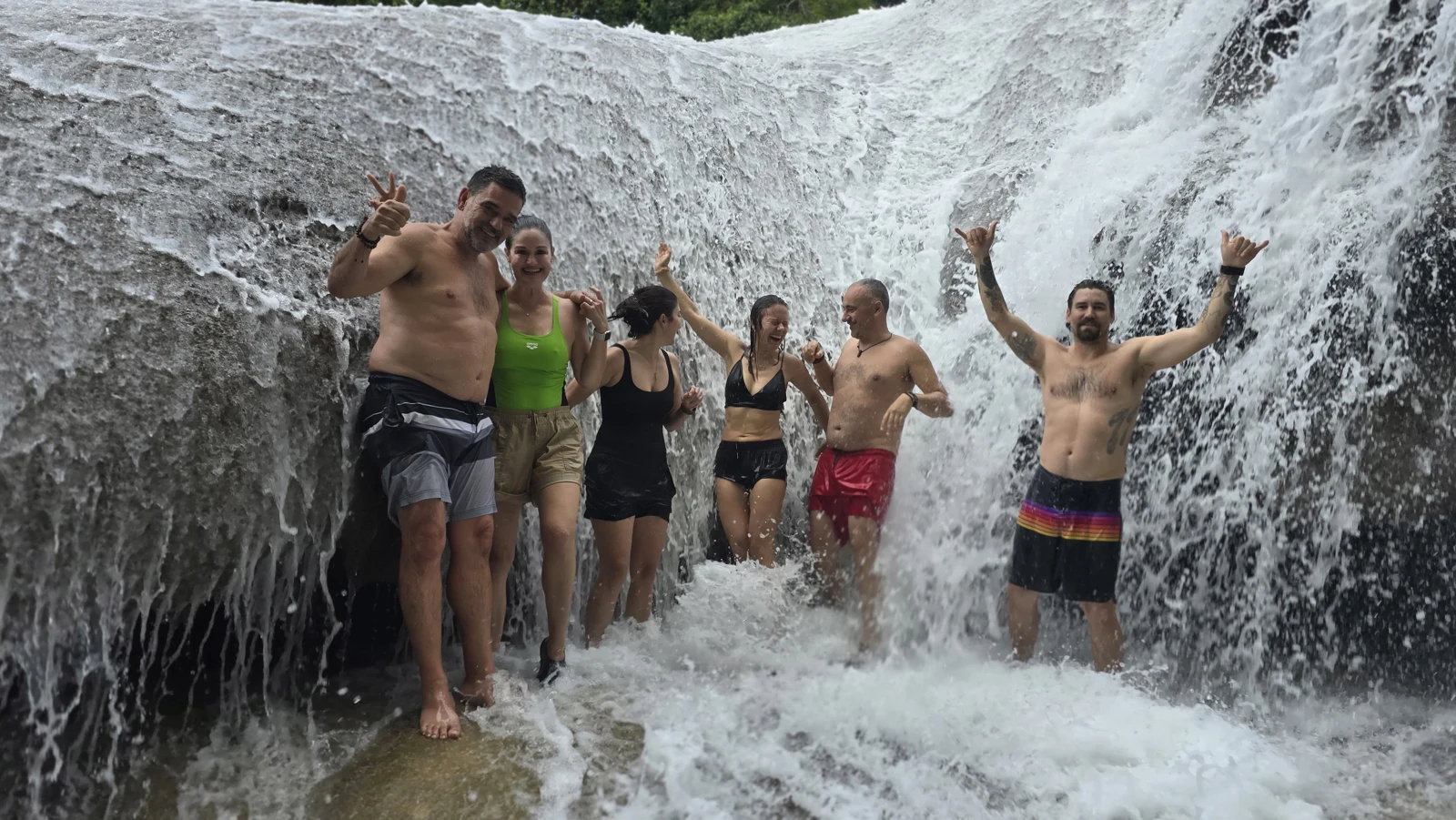 The six of us beneath the waterfall